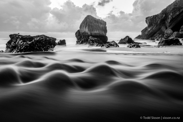 Black and White image of beautiful standing waves and rock formations, Heaphy Track. West Coast, New Zealand - stock photo, canvas, fine art print